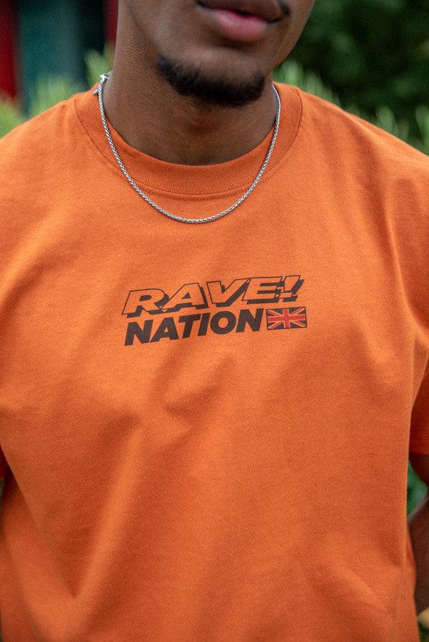 T-Shirt in Texas Orange With 90s Rave Smiley Positive Print-1